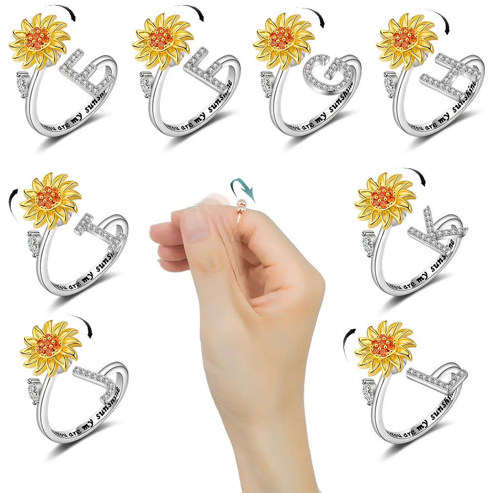 spinning sunflower letter ring